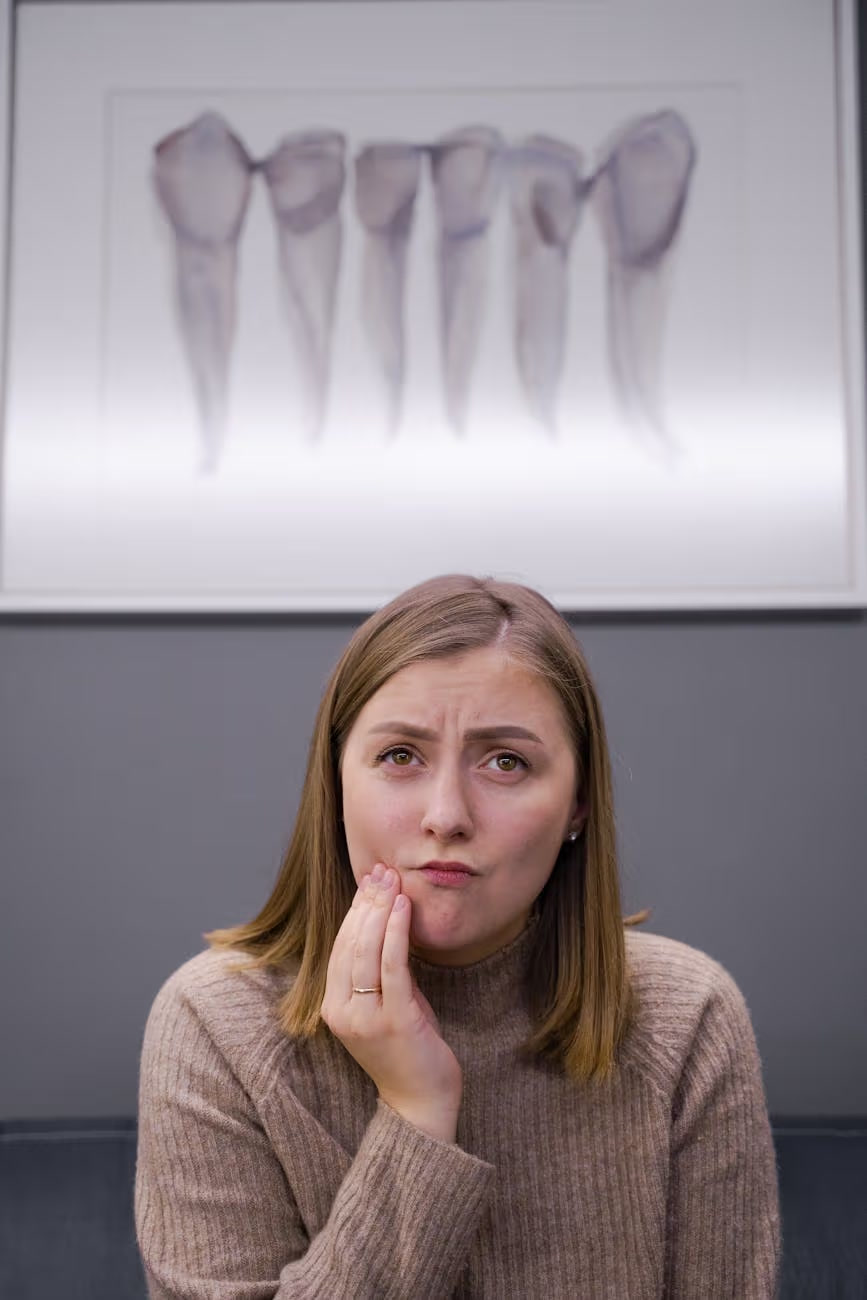 Patient experiencing dental pain - Whitehaven Dental Ottawa emergency care