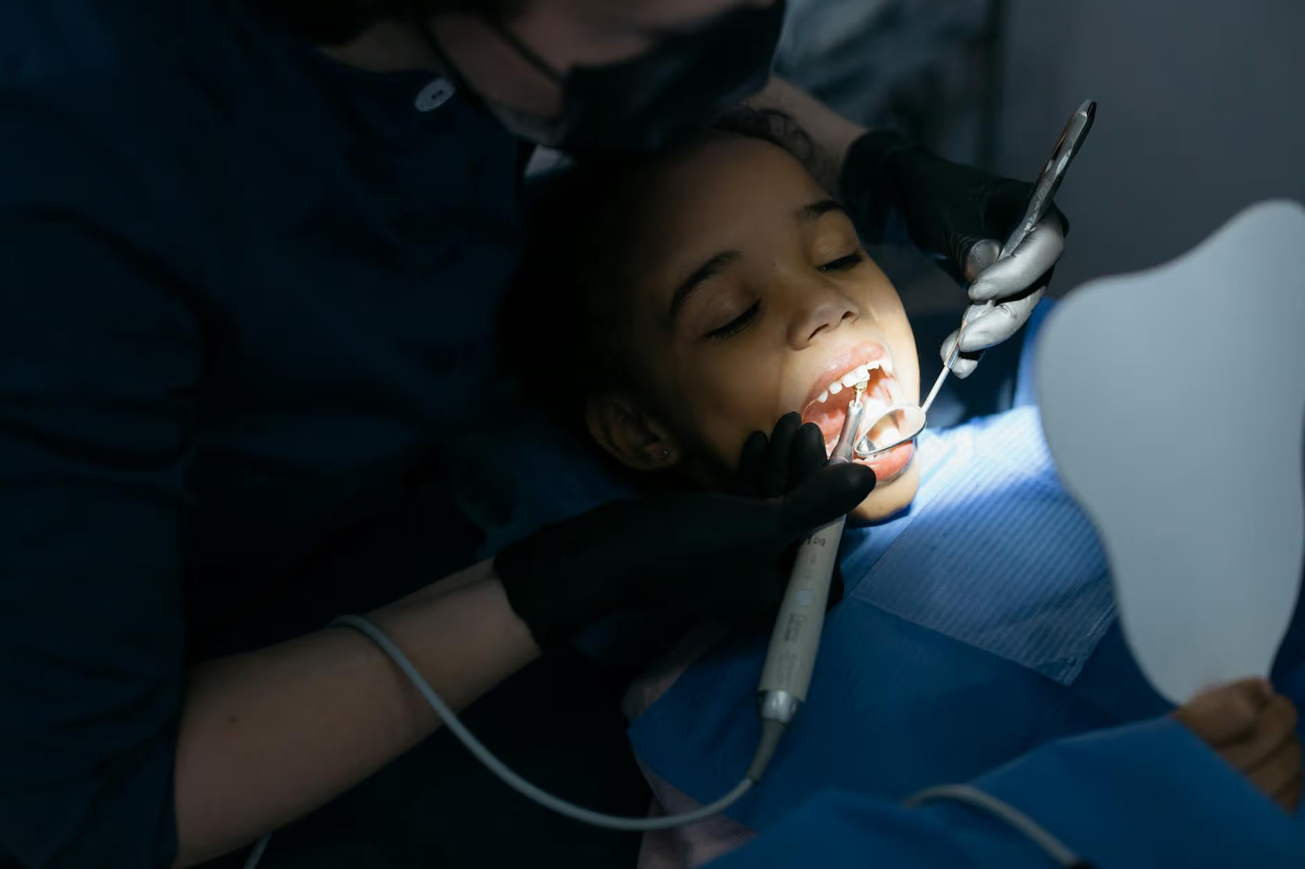 Happy child with toothbrush - pediatric dentistry in Ottawa